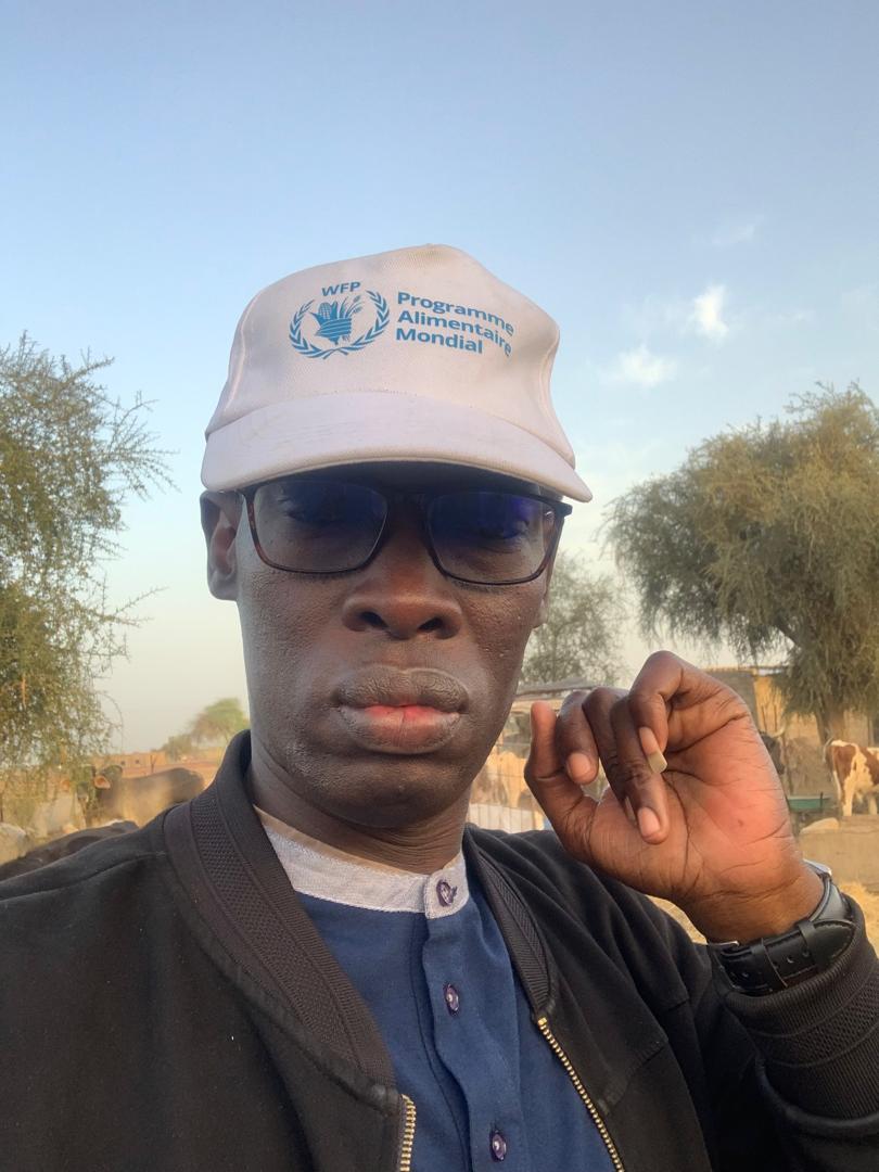 Translab interpreter in the field with WFP